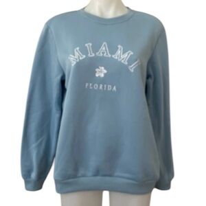 (NWOT) Shein Women’s Miami Florida Light Blue Sweatshirt. Medium